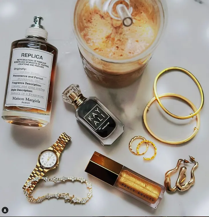 Lifestyle flat lay with jewelry and perfume