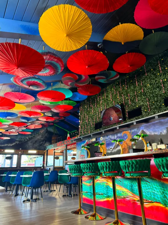 Restaurant interior with umbrellas